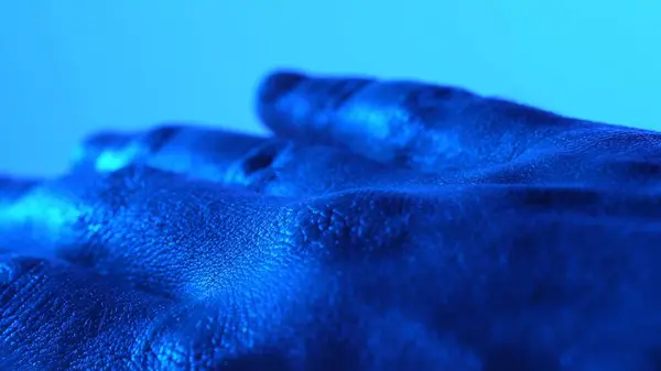 Detailed drawing of palm skin. Human closeup medicine skin. Healthy naked surface. Blue light.