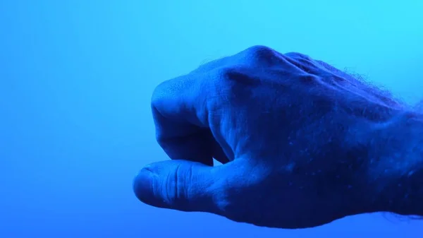 Detail of skin pattern. Human closeup medicine skin. Healthy naked surface. Blue light.