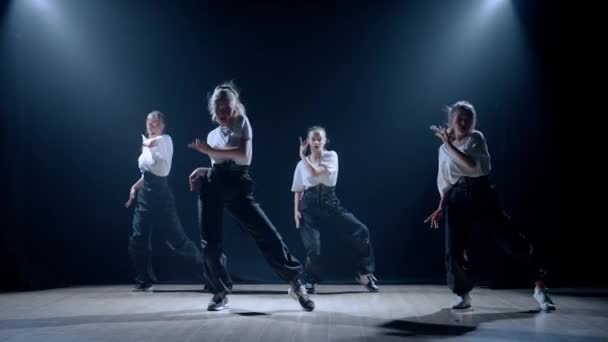 Frame Black Background Light Rays Group Consisting Attractive Girls Dancing — Stock Video