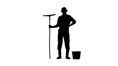 Çiftçilik ve bahçıvanlık yaratıcı konsepti. Beyaz arka planda alfa kanallı bir çiftçinin portresi. Ayakta duran, elinde tırmık ve kova tutan bahçıvanın silueti..