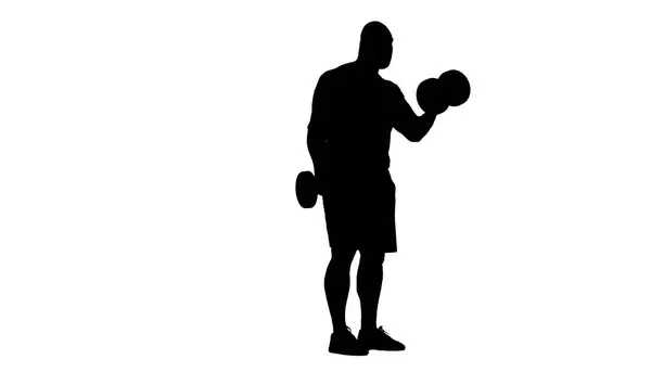 Shot Man Stands Silhouette White Background Athlete Bodybuilder Demonstrates Exercise — Stock Photo, Image