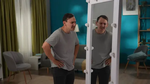 Man Bipolar Disorder Mirror Living Room Man Writhing Laughing Mocking — Stock Photo, Image