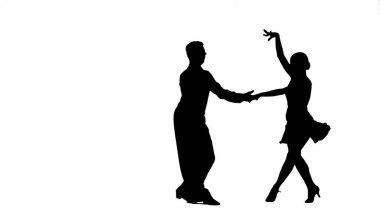 Bu çarpıcı görüntü dans eden bir çiftin siluetini, dans etmenin zarafet ve tutkusunu sergileyerek dinamik bir pozda yakalıyor. Kadın ve erkek dans adımlarının ortasında betimlenir, vücutları.