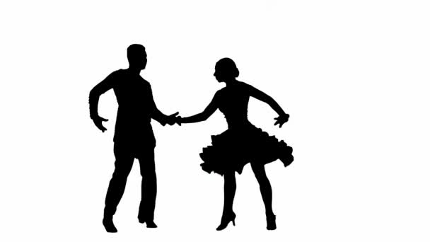 这段动人的视频以动态的姿态捕捉了一对舞伴的轮廓 展现了舞蹈的优雅与激情 男人和女人被描绘成中间的舞步 他们的身体 — 图库视频影像
