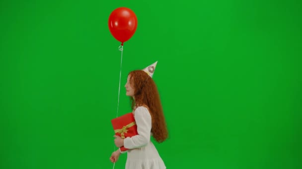 Redheaded Little Girl White Dress Festive Cap Her Head Gift — Stock Video