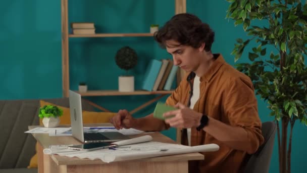 Medium Shot Capturing Man Working His Home Office Getting Phone — Stock Video