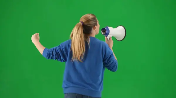 Woman Facing Away Camera Speaking Megaphone Raised Fist Back View — Stock Photo, Image