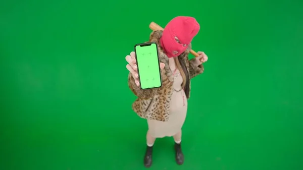 Woman Pink Balaclava Tiger Coat Dress Showing Green Screen Phone — Stock Photo, Image