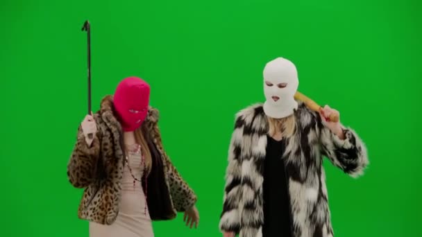 Two Women White Pink Balaclavas Dancing Funny Bat Crowbar Freak — Stock Video
