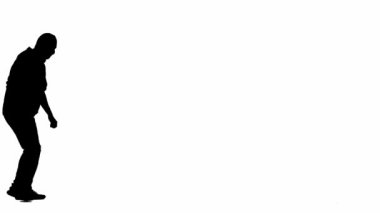 İzole edilmiş beyaz arka planda siyah bir hırsız silueti. Kapüşonlu ve kar maskeli bir erkek soyguncu elinde bıçakla suç işlemeye hazırlanıyor. Yan görünüm