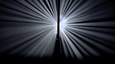 Modern koreografi ve akrobasi yaratıcı reklam konsepti. Parlak spot ışıklarına karşı siyah arkaplanda izole edilmiş bir kadın silueti. Kız hava dansçısı hava ipeğinde gösteri yapıyor.