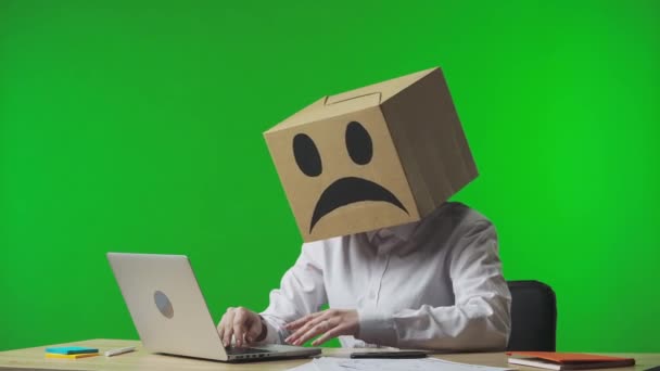 Woman Cardboard Box Negative Emoji Her Head Studio Green Background — Stock Video