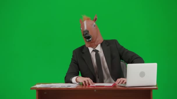 Man Business Suit Horse Head Mask Studio Green Background Businessman — Stock Video