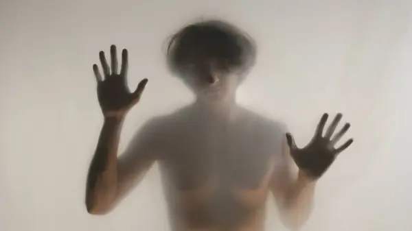 Blurred Silhouette Man Naked Torso Frosted Curtain Glass Man Touches — Stock Photo, Image