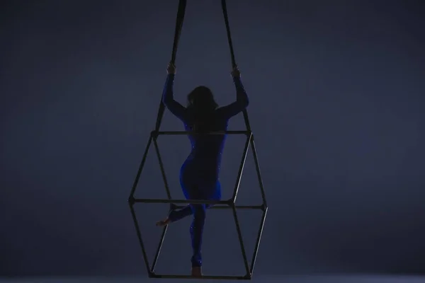 Silhouette Aerial Gymnast Blue Leotard Rhinestones Dark Studio Background Female — Stock Photo, Image