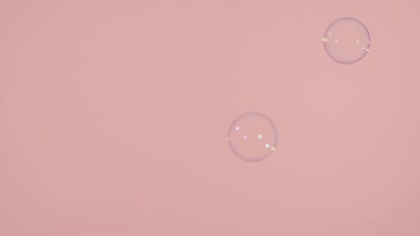 粉红背景的肥皂泡 — 图库视频影像
