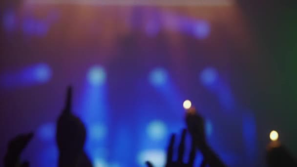 Breathtaking Moment Captured Lively Concert Silhouette Hands Raised Lit Lighters — Stock Video