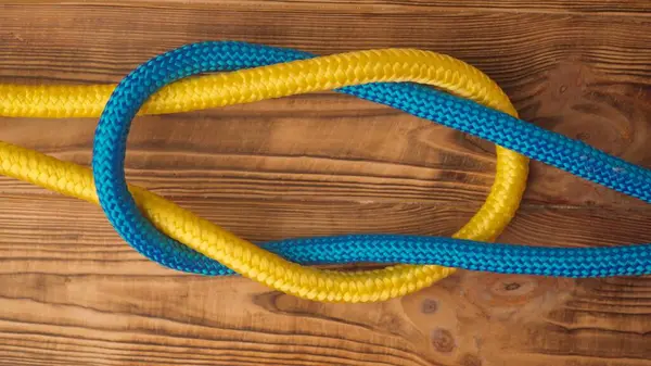 Marine Safety Sport Knots Tying Process Yellow Blue Colored Ropes Stock Image