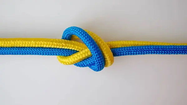 Marine Safety Sport Knots Tying Process Yellow Blue Colored Ropes Royalty Free Stock Photos