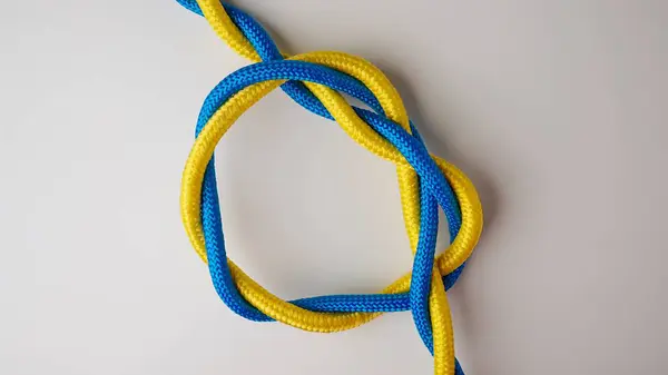 Marine Safety Sport Knots Tying Process Yellow Blue Colored Ropes Royalty Free Stock Images