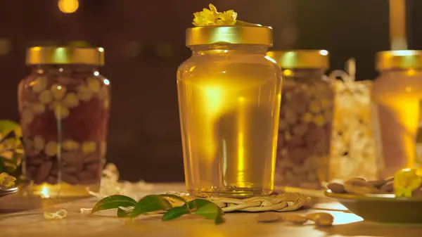 Healthy Organic Honey Nuts Glass Jars Standing Wooden Table Fresh Imagine de stoc