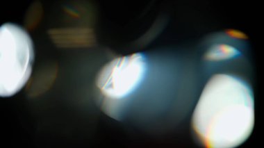 Siyah arkaplanda gerçek optik bokeh.