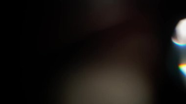 Siyah arkaplanda gerçek optik bokeh.