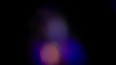 Siyah arkaplanda gerçek optik bokeh.