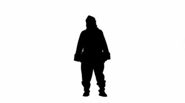 Noel ve yeni yıl tatili konsepti. Beyaz izole arka planda, Noel Baba kostümlü bir adamın siyah silueti. Noel Baba el hareketi yapıyor. Buraya gel.