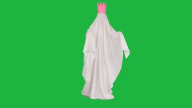 Kameraya poz veren hayalet gibi giyinmiş biri. Beyaz çarşaflı cadılar bayramı hayaleti ve pembe taçla elini hareket ettiren kameraya poz veren yeşil ekran arka plan, tam boy. Ürkütücü konsept.