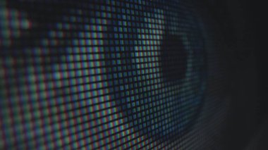 Bir LED piksel görüntüsünün canlı renk dizisini gösteren detaylı bir makro görünüm, bireysel pikselleri ortaya çıkarır.