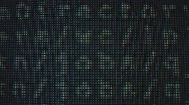 Büyütülmüş görüntü, dijital ekranda kırmızı, yeşil ve mavi piksellerin düzenini gösteriyor. Makro