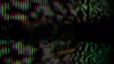 Ekrandaki canlı piksel ızgarasının çarpıcı bir yakın plan görüntüsü, renkli ışık ve desenler dizisini gösterir.