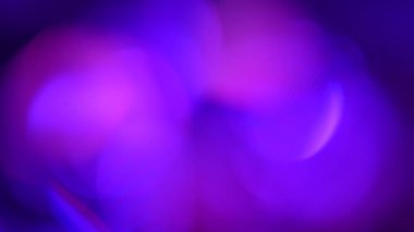 Mor ve pembe renkli canlı bir gradyan içeren büyüleyici soyut bir arka plan rahatlatıcı ve sanatsal bir görsel deneyim yaratıyor. Makro