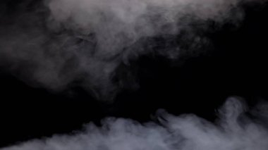 Arka planda dumanlı dumanlar. Sinema sahneleri, VFX geçişleri, müzik videoları, korku veya bilim kurgu filmleri, soyut reklamlar veya dijital sanat ve hareket grafiklerinde üst üste bindirme