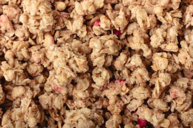 Granola dokusu. Ev yapımı kahvaltı geçmişi. Sağlıklı yiyeceklerin en üst görüntüsü.