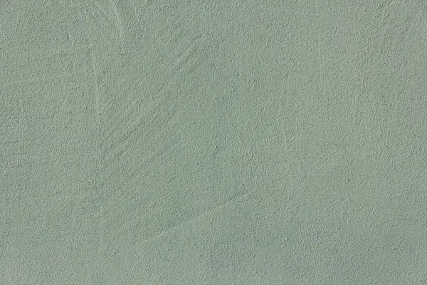 Duvar arkası. Beton doku. Yeşil pastel renkli duvar kağıdı.