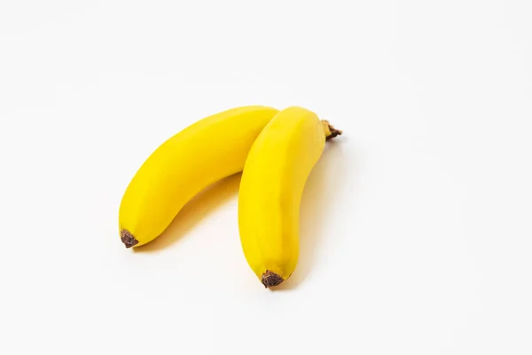 Banana Amarela Isolada Mesa Branca Fundo Branco — Fotografia de Stock