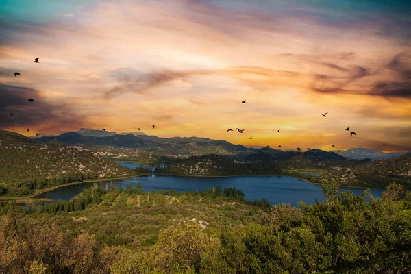 stock image Beautiful Bacina Lakes in Croatia. A green valley with water and a beautiful sky.