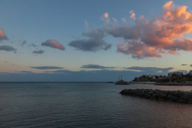 Beautiful seascape. Coast of the island of Crete - Greece area of Lerapetra. There are dramatic clouds in the sky.