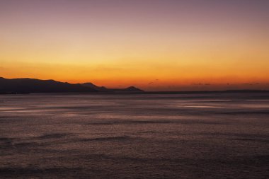 Beautiful landscape. Coast of the island of Crete - Greece area of Lerapetra Eden Rock. Beautiful sky at sunrise over the sea.