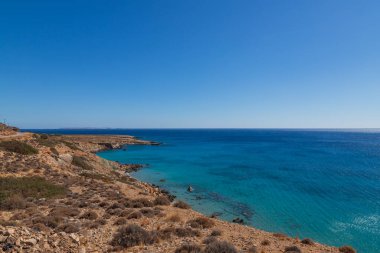 Beautiful landscape. Coast of the island of Crete - Greece area of Lerapetra Eden Rock. Beautiful sky at sunrise over the sea.