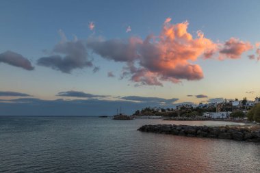 Beautiful landscape. Coast of the island of Crete - Greece area of Lerapetra Eden Rock. Beautiful sky at sunrise over the sea.