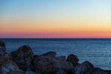 Beautiful seascape. Coast of the island of Crete - Greece area of Lerapetra. There are dramatic clouds in the sky.