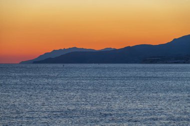 Beautiful seascape. Coast of the island of Crete - Greece area of Lerapetra. There are dramatic clouds in the sky.