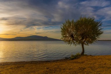 Lake landscape after sunset. Novomlynska reservoir - lower with a view of Palava. Czech Republic - South Moravia clipart