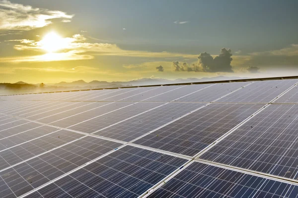 stock image Solar panels, whose top surface is soiled by rainwater stains, bird droppings and dust, need to be cleaned to optimize the energy storage of the sun during the day, soft focus.