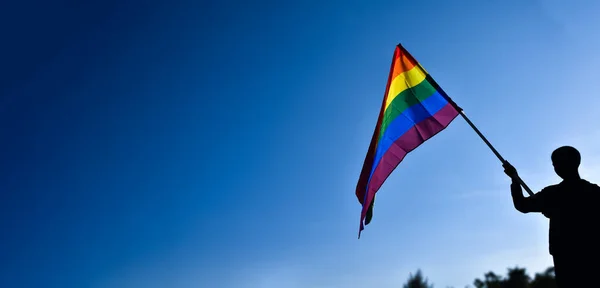 Rainbow Flag Lgbt Simbol Holding Hands Boy Clear Bluesky Background — Stock Photo, Image