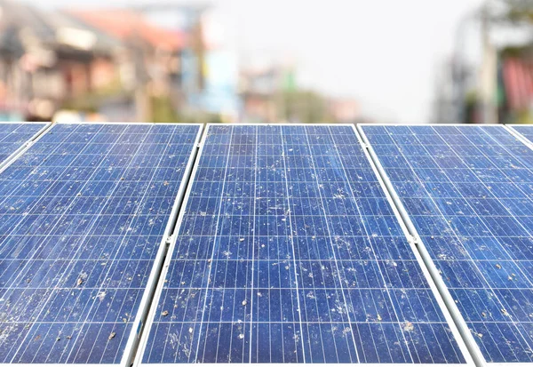 Photovoltaic rooftop panels or solar cell rooftop panels which are so dirty with dust, smoke, rain stain, dried leaves and bird\'s droppings on upper surface, maintenance to increase quality concept.