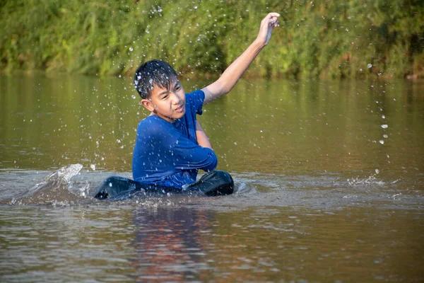 Asian Boy Blue Shirt Spending His Freetimes Diving Swimming Throwing Stock Image